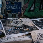 Saccage grenoble : propreté et traces sur rue, vidéos IA